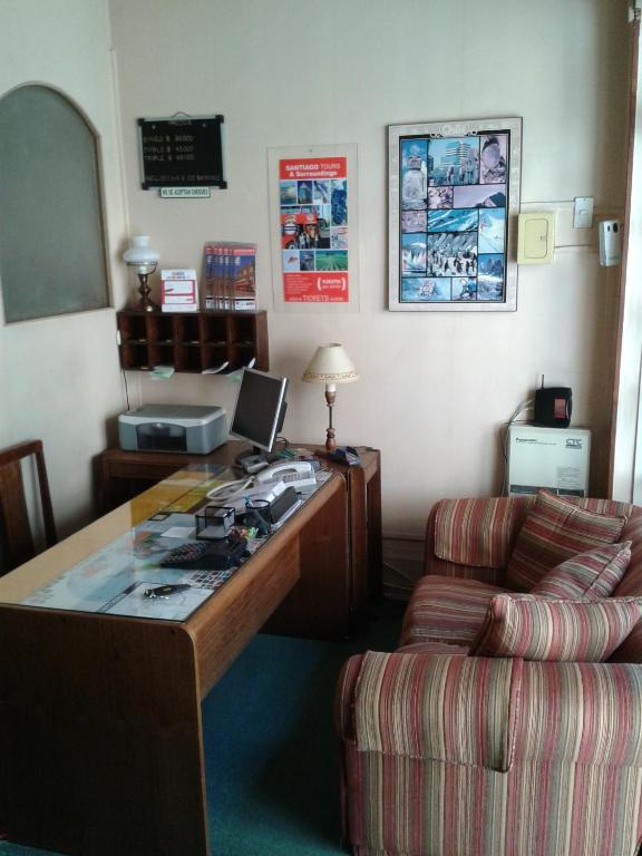TV a/nebo společenská místnost v ubytování Hotel Las Flores