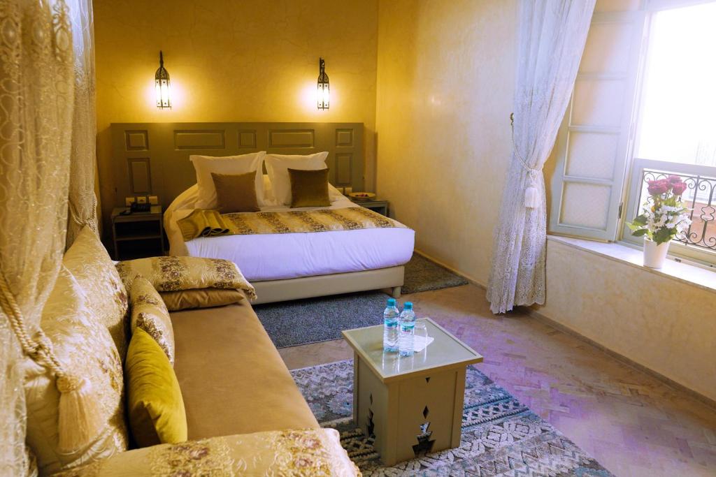 Postel nebo postele na pokoji v ubytování Riad Zidania