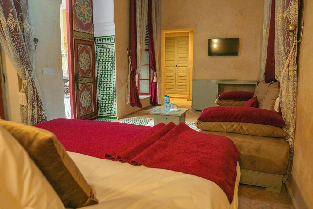Postel nebo postele na pokoji v ubytování Riad Zidania