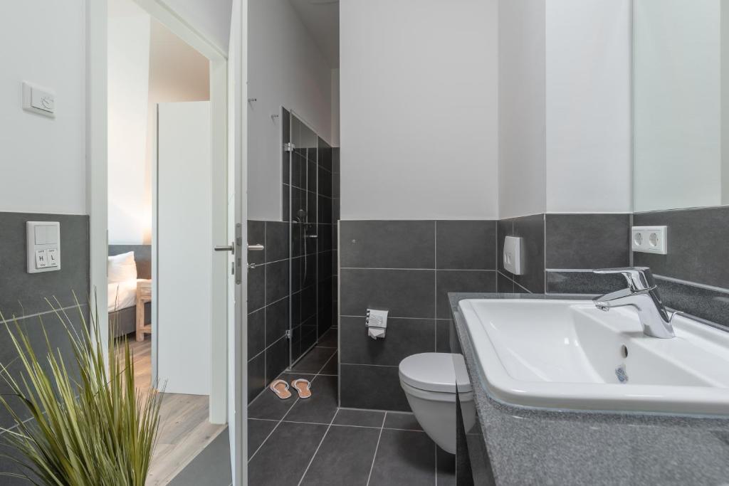 Koupelna v ubytování Residenz Seestern