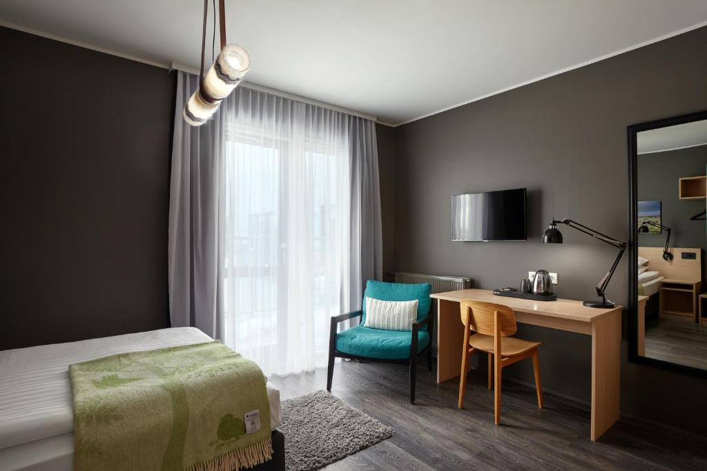 Postel nebo postele na pokoji v ubytování Alda Hotel Reykjavík