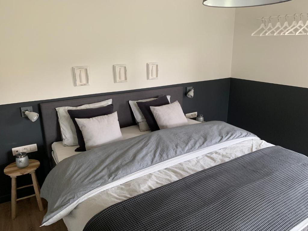 Postel nebo postele na pokoji v ubytování B&B Dageraad