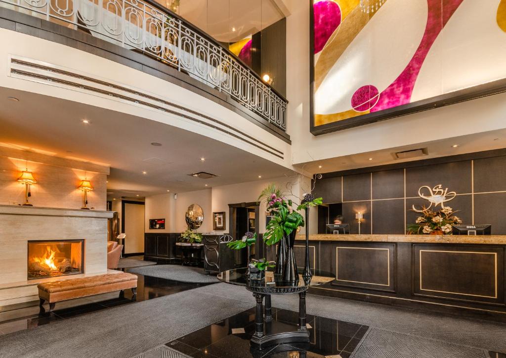 Posezení v ubytování Le St-Martin Hotel Centre-ville – Hotel Particulier