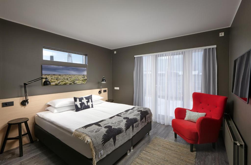 Postel nebo postele na pokoji v ubytování Alda Hotel Reykjavík