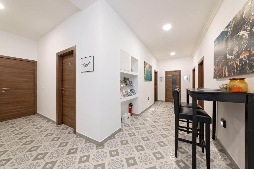 Kuchyň nebo kuchyňský kout v ubytování San Martino Rooms