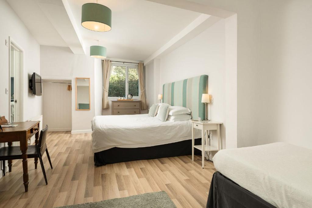 Postel nebo postele na pokoji v ubytování Chillington House