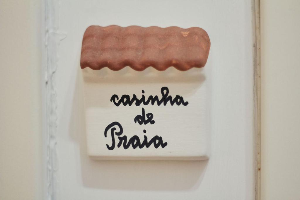 una galleta en una caja con las palabras se quejan como Santa en Casinha da Praia - Vila Nova de Gaia en Vila Nova de Gaia