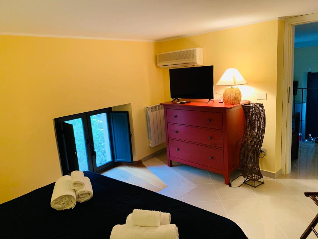 Posteľ alebo postele v izbe v ubytovaní Amartìa Apartments