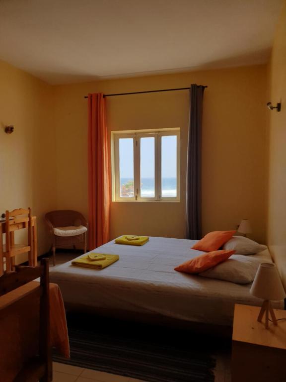 Postel nebo postele na pokoji v ubytování Casa D'Mar