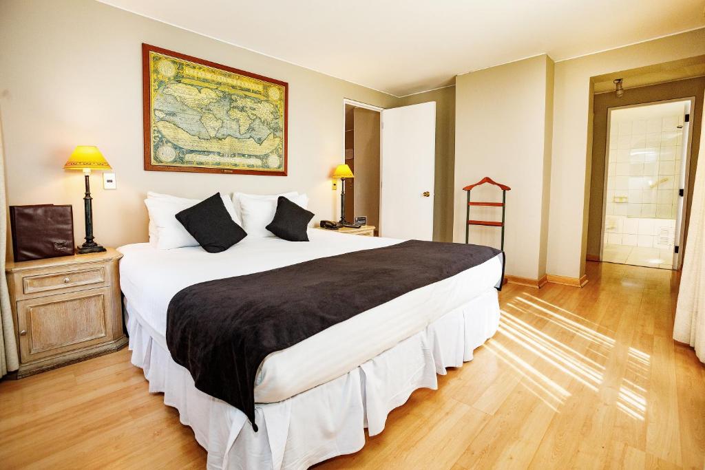 Cama o camas de una habitación en Tempo Rent Apart Hotel