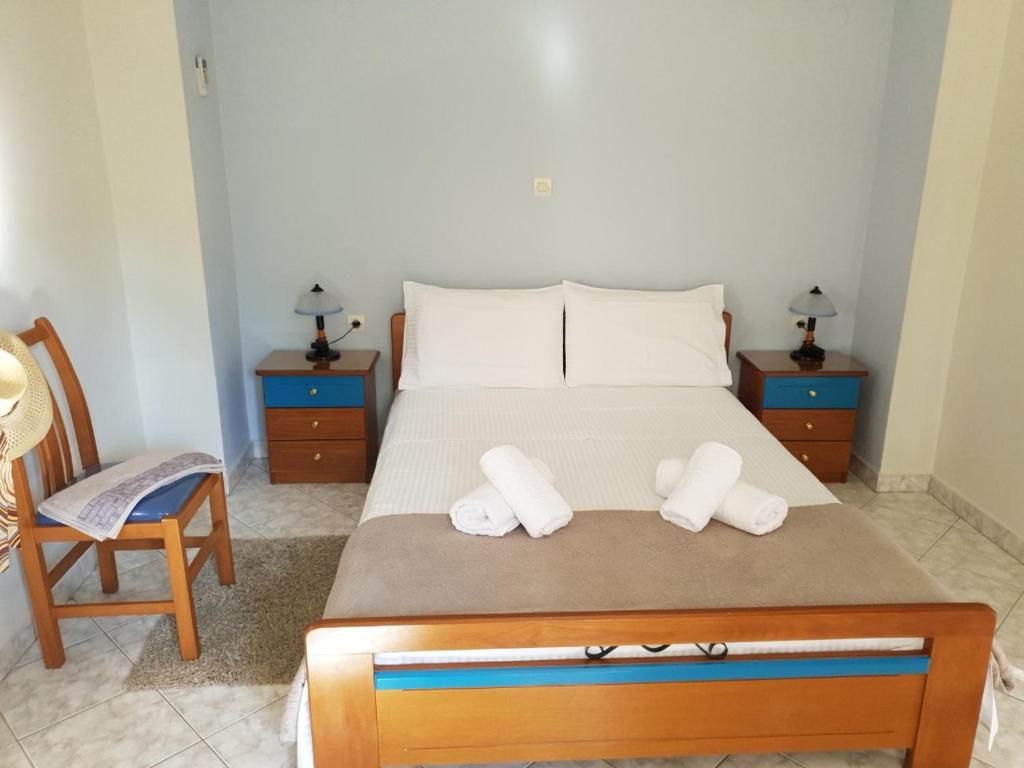 Postel nebo postele na pokoji v ubytování Epi Apartments