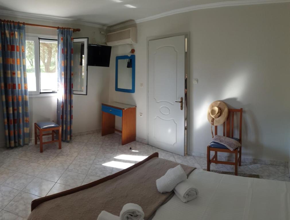 Postel nebo postele na pokoji v ubytování Epi Apartments
