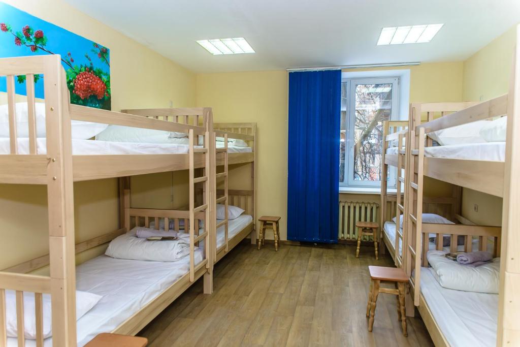 Postel nebo postele na pokoji v ubytování BOTANIC GLOBUS HOSTEL