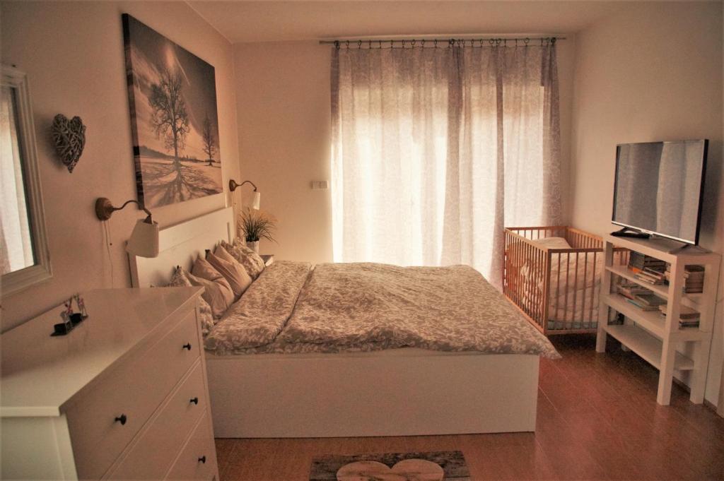Postel nebo postele na pokoji v ubytování Buxusson Resort