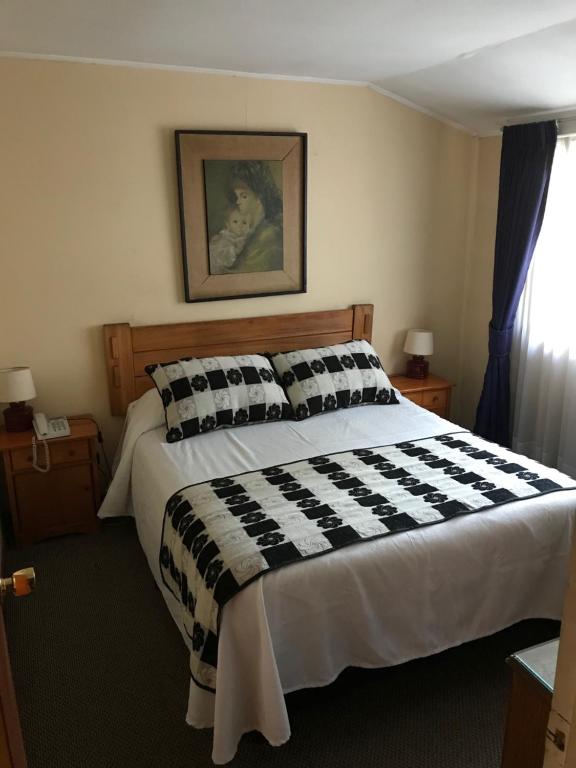 Postel nebo postele na pokoji v ubytování Hotel Luanco