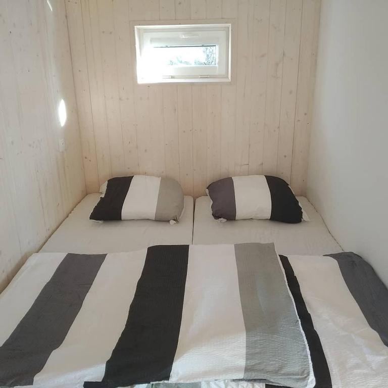 Postel nebo postele na pokoji v ubytování Chatka u Horalíků