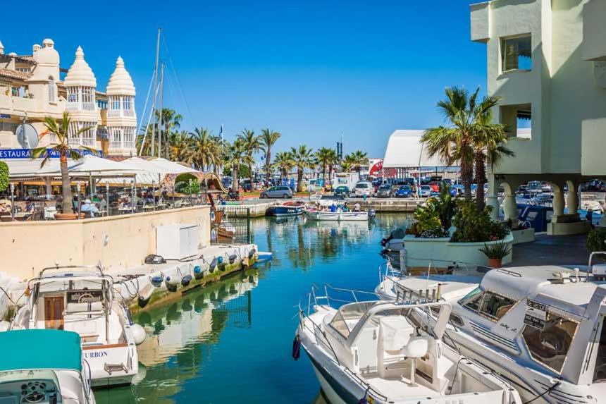 a group of boats docked in a marina at Apartamento Sun Beach in Benalmádena