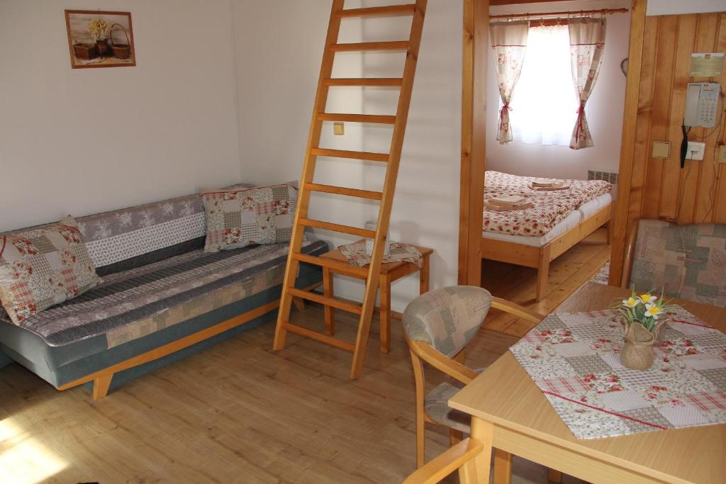 Postel nebo postele na pokoji v ubytování Chatky 101 a 411 Tatralandia