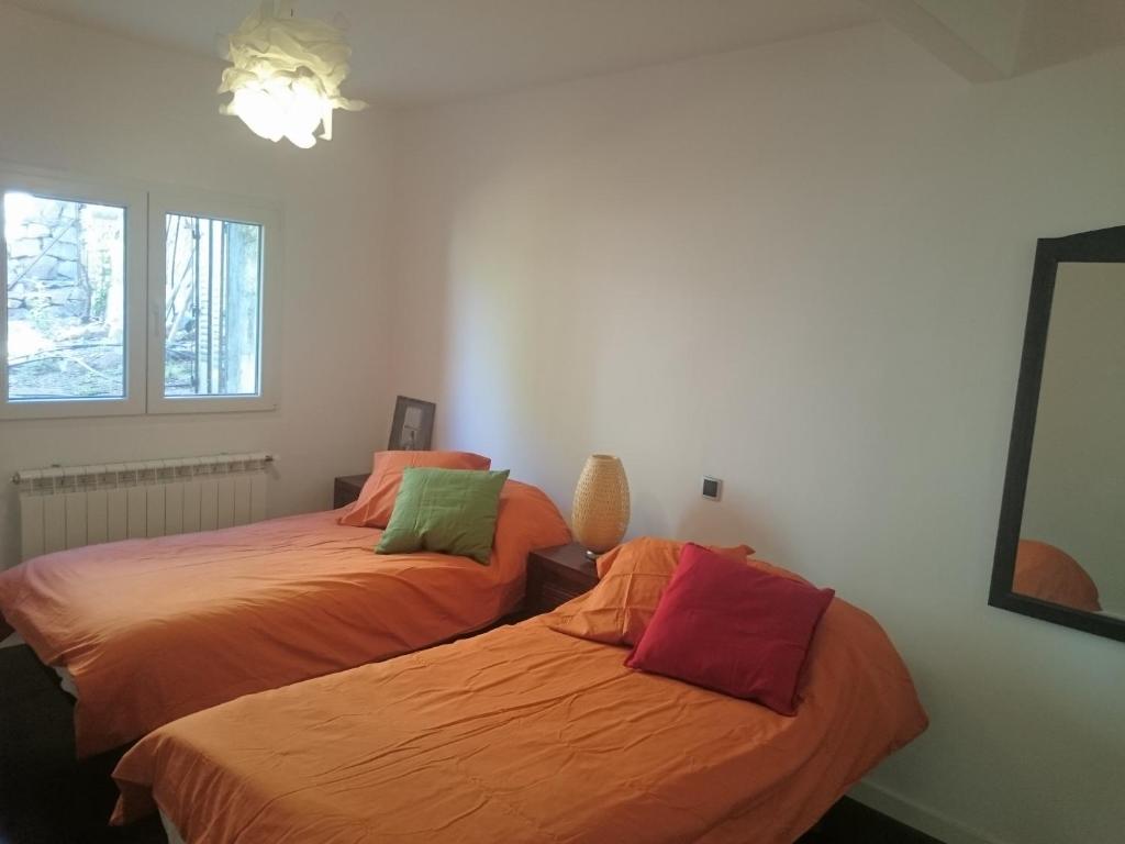Postel nebo postele na pokoji v ubytování Piedra Libre Apartamentos