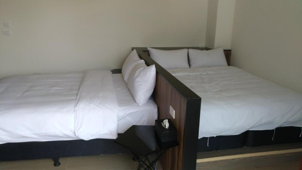 Postel nebo postele na pokoji v ubytování Tropical Fish B&B