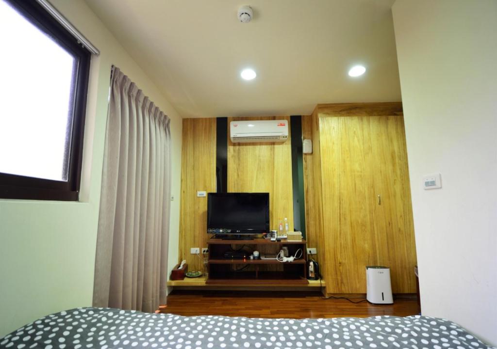 TV a/nebo společenská místnost v ubytování Sanyi Wei Wei Feng B&B