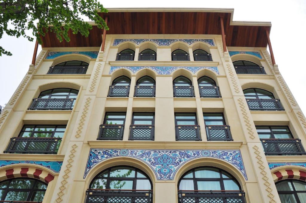 a tall building with a lot of windows at Neorion Hotel - Special Class in Istanbul