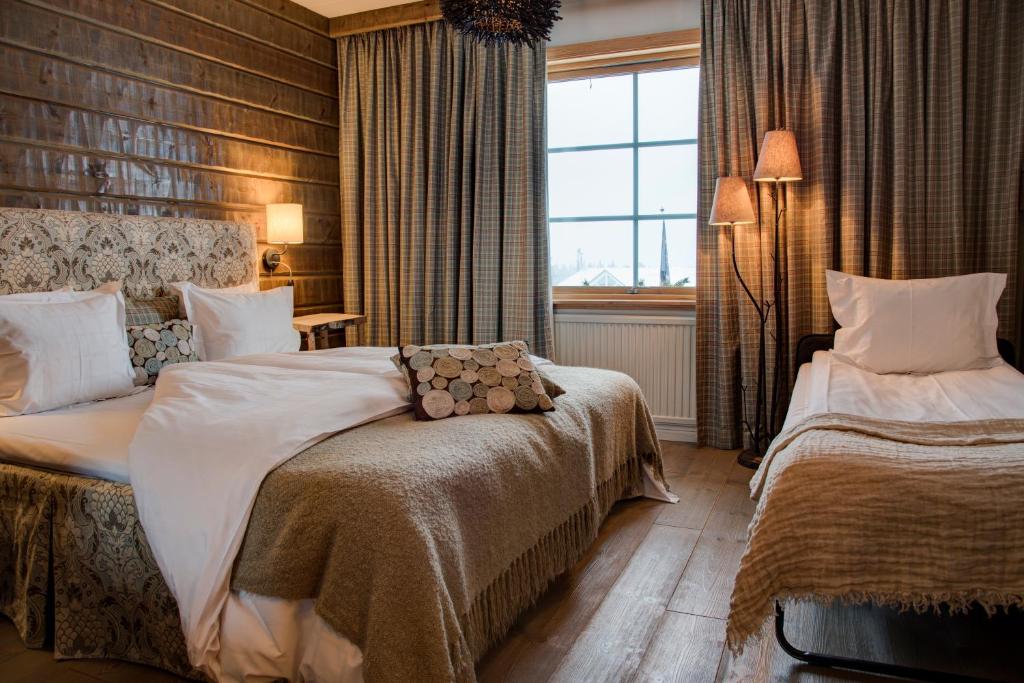 Кровать или кровати в номере Hotel Bügelhof