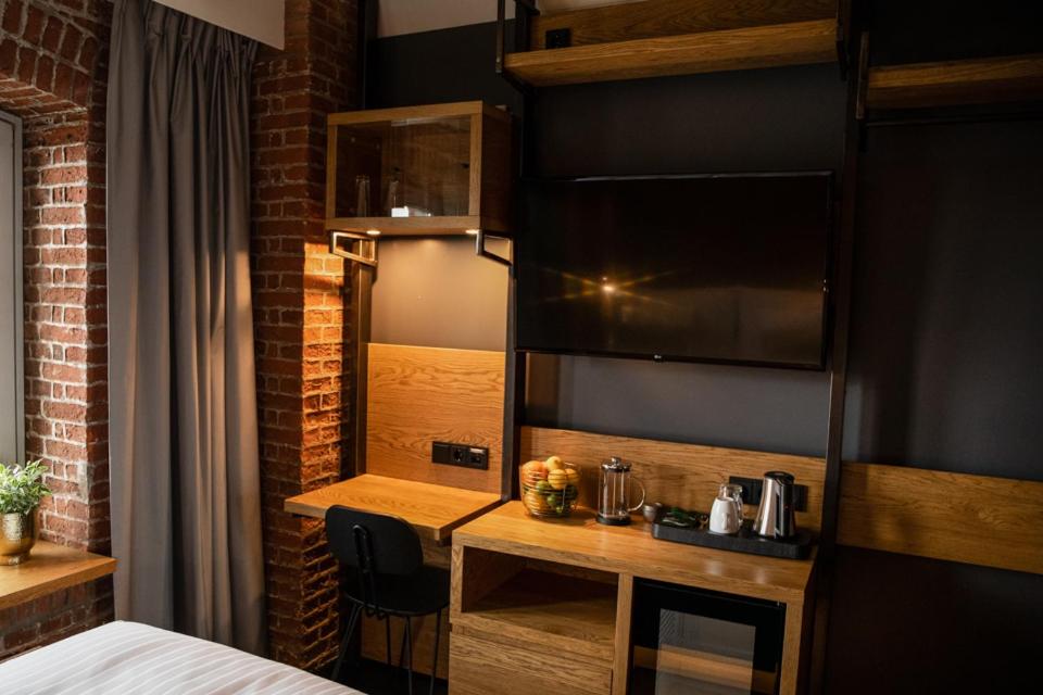 Postel nebo postele na pokoji v ubytování GINN Hotel Hamburg Elbspeicher