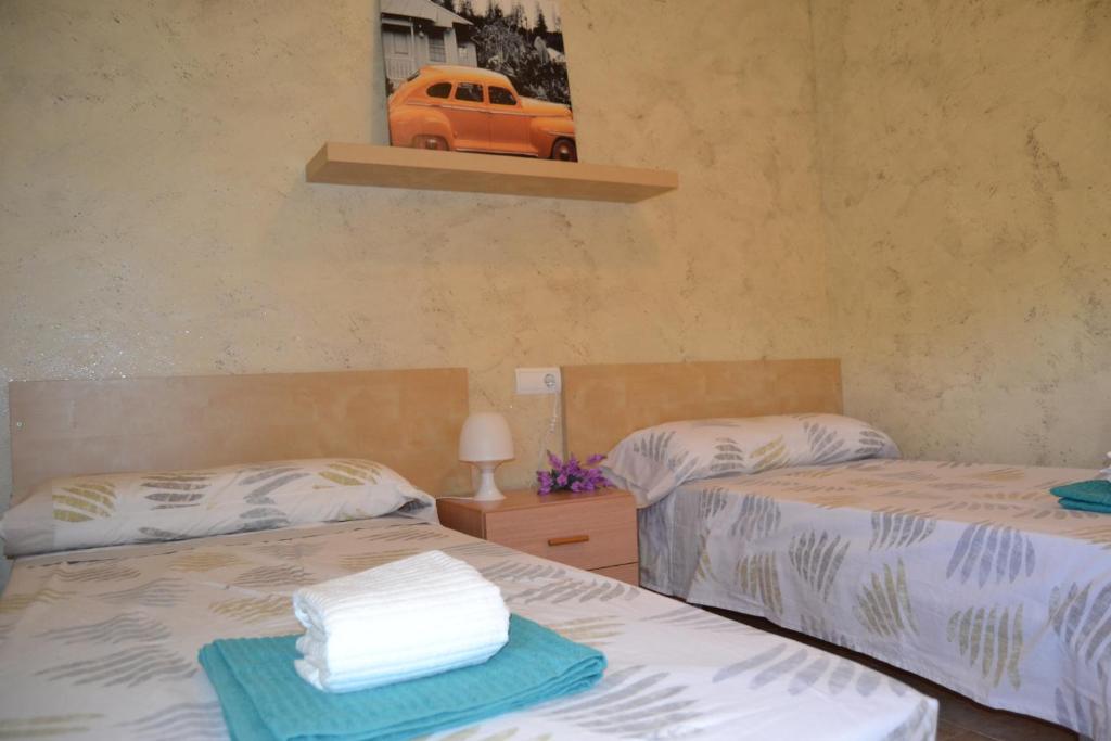 Posteľ alebo postele v izbe v ubytovaní Fabuloso apartamento familiar con piscina en Salou