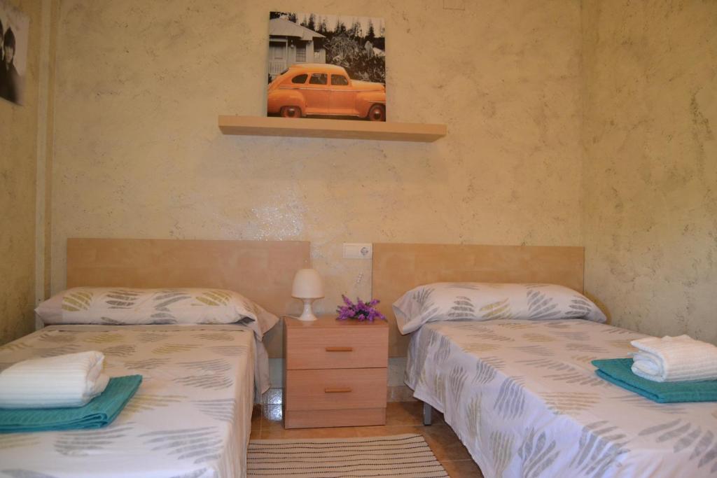 Posteľ alebo postele v izbe v ubytovaní Fabuloso apartamento familiar con piscina en Salou