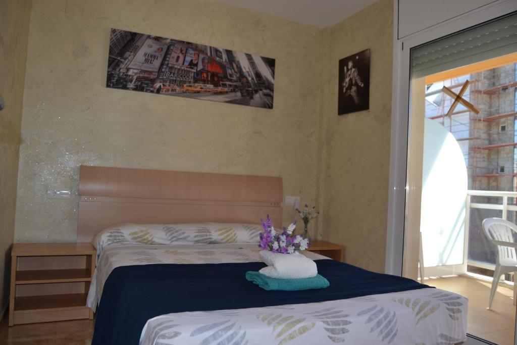 Posteľ alebo postele v izbe v ubytovaní Fabuloso apartamento familiar con piscina en Salou
