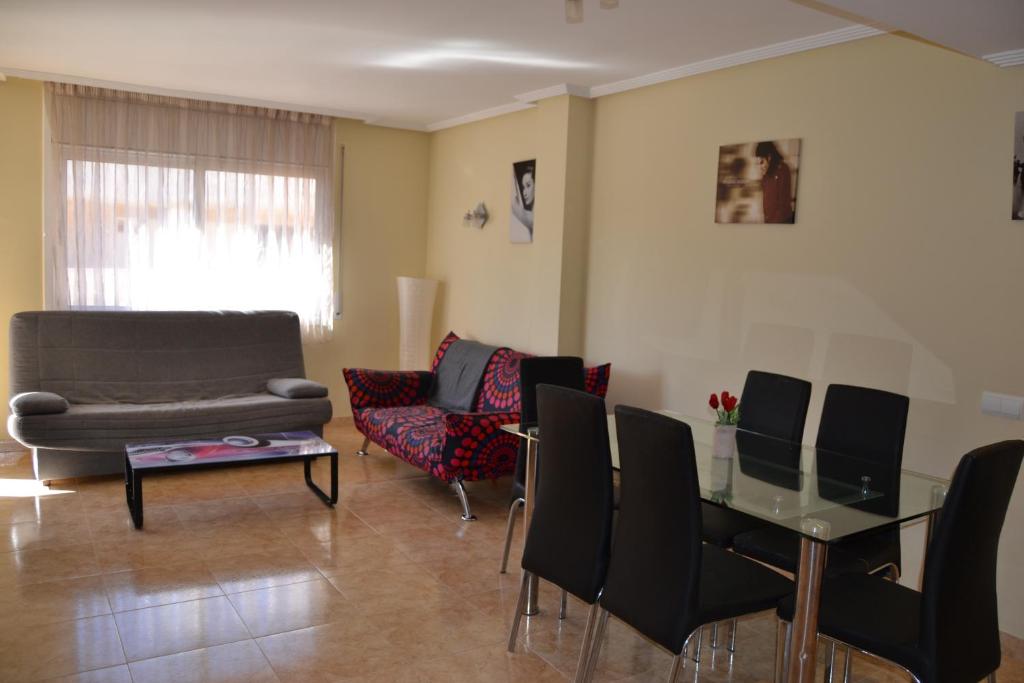 Posedenie v ubytovaní Fabuloso apartamento familiar con piscina en Salou