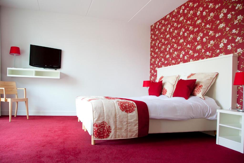 Postel nebo postele na pokoji v ubytování Hotel Restaurant Lunia
