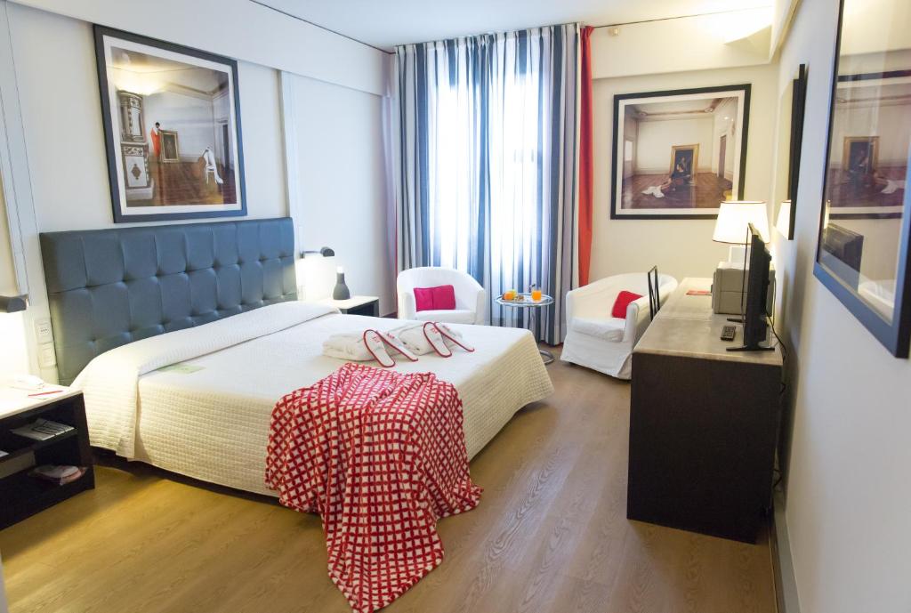 Postel nebo postele na pokoji v ubytování Art Hotel Museo