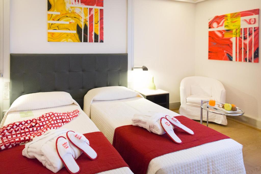 Postel nebo postele na pokoji v ubytování Art Hotel Museo