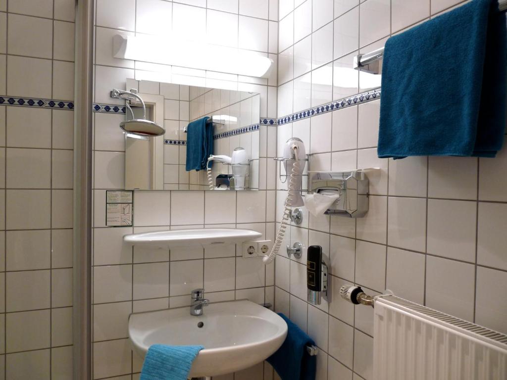 Koupelna v ubytování Hotel Geissler