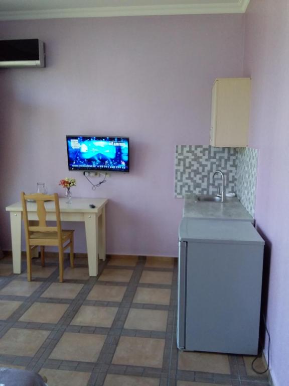 TV a/nebo společenská místnost v ubytování Hotel Inter