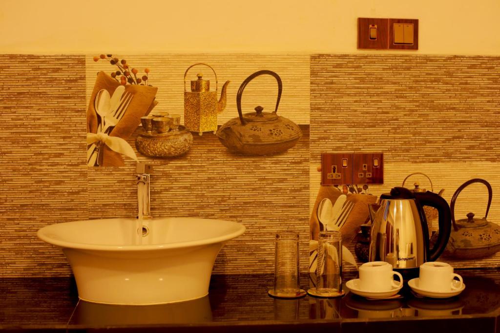 Příslušenství pro přípravu čaje a kávy v ubytování Opulence Colombo