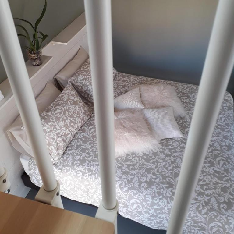 Postel nebo postele na pokoji v ubytování L'ALBEROCASA