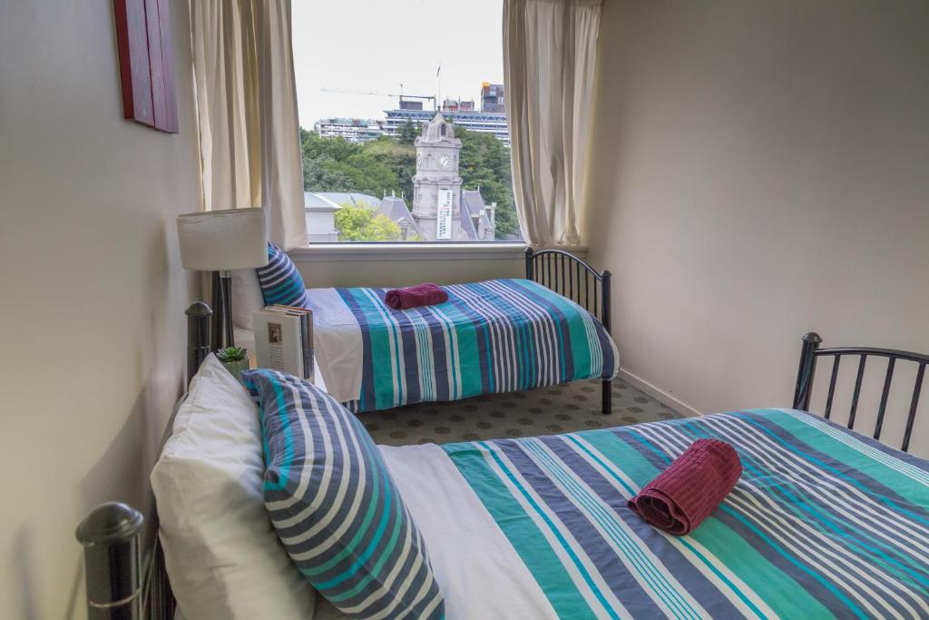 Postel nebo postele na pokoji v ubytování Choice Backpackers