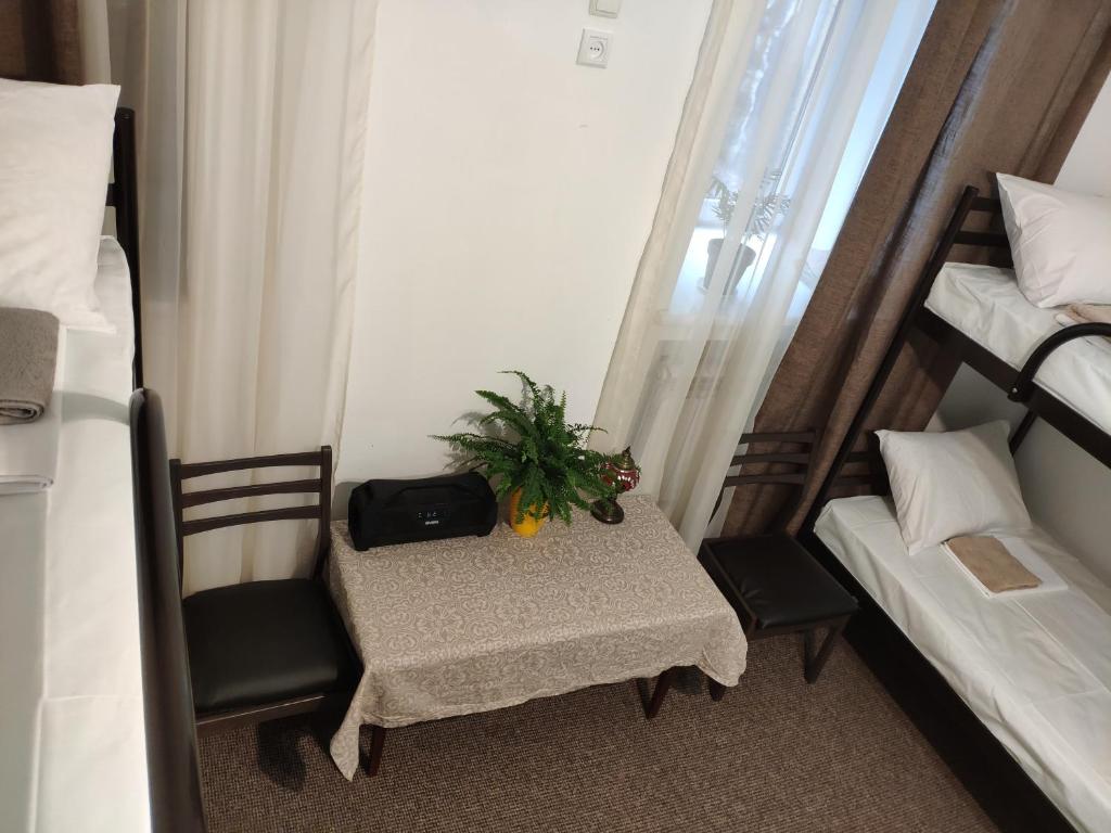 Postel nebo postele na pokoji v ubytování Friends Forever