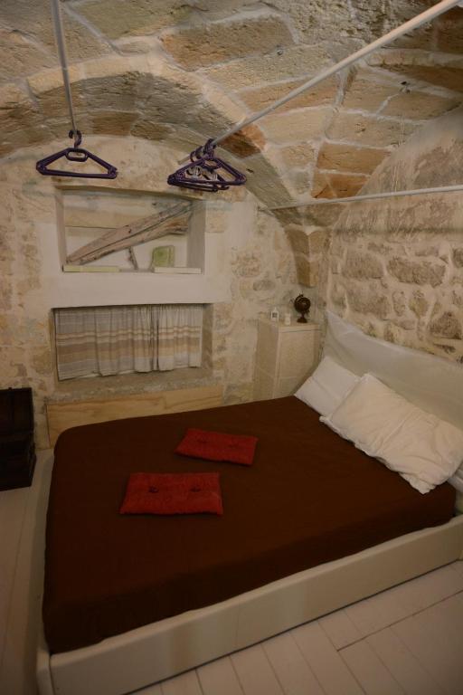 Postel nebo postele na pokoji v ubytování B&B DOMUS GAIA