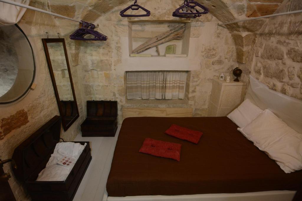 Postel nebo postele na pokoji v ubytování B&B DOMUS GAIA