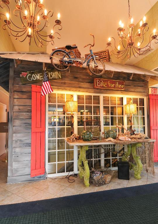a store with a bike hanging from the ceiling at Holiday Pavilion Resort on the Boardwalk in Myrtle Beach