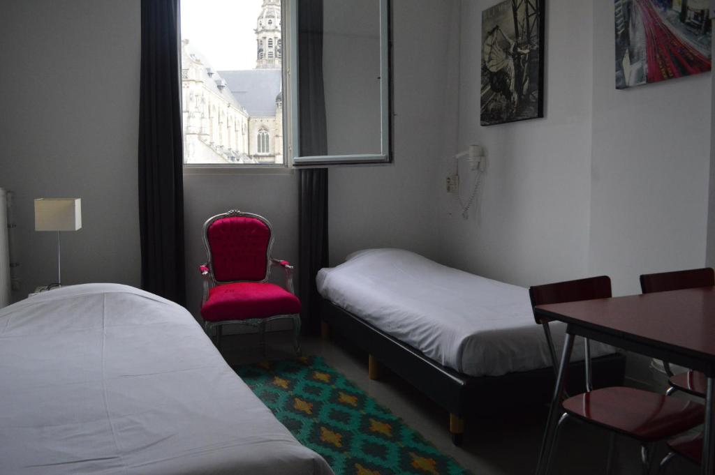 Llit o llits en una habitació de Hotel Urban Dreams