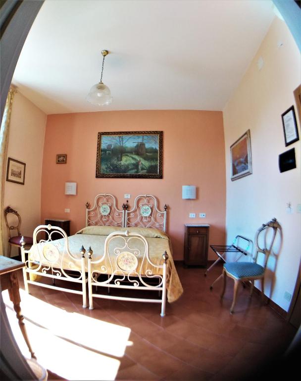 TV a/nebo společenská místnost v ubytování Hotel Merlini