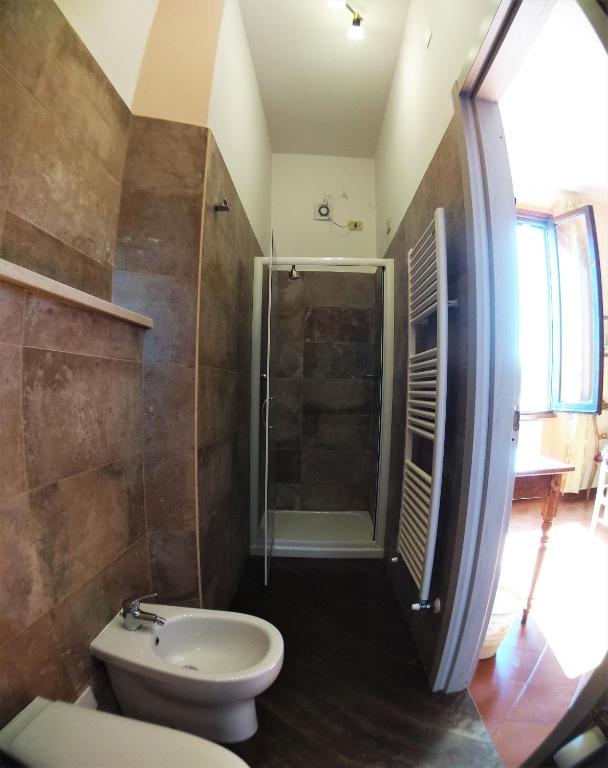 Koupelna v ubytování Hotel Merlini