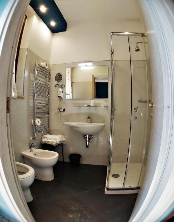 Koupelna v ubytování Hotel Merlini