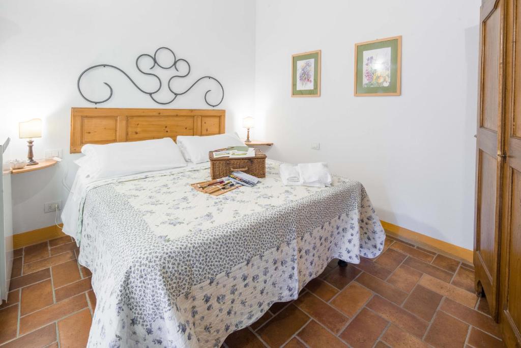 Postel nebo postele na pokoji v ubytování Ancora del Chianti
