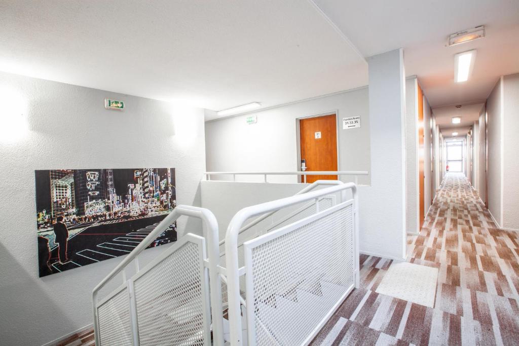 Postel nebo postele na pokoji v ubytování Best Hotel Lyon - Saint Priest